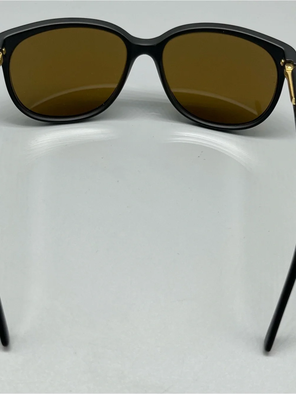 Revo Matte Black Sunglasses with Purple Mirrored Lenses